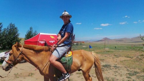 Riding a horse in Mongolia