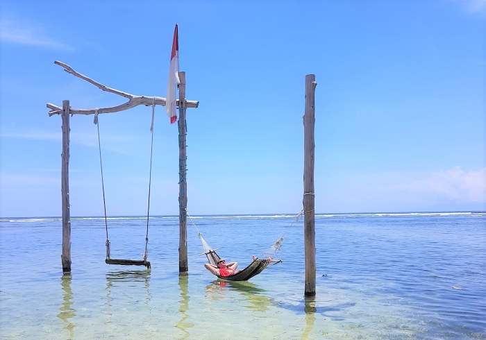 Jake relaxing in the sea in Indonesia