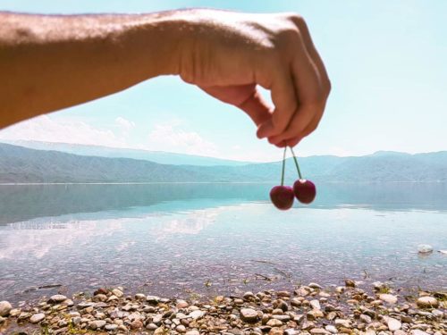 Eating cherries at Toktogul lake - Kyrgyzstan