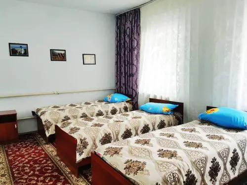 Kagan guesthouse bedroom - Toktogul, Kyrgyzstan