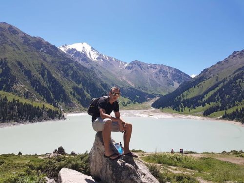 Relaxing on a rock at Big Almaty lake - Almaty, Kazakhstan